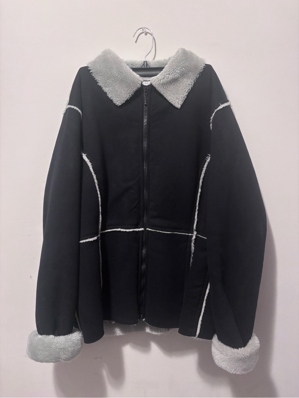 Kim Rogers black and white furred coat